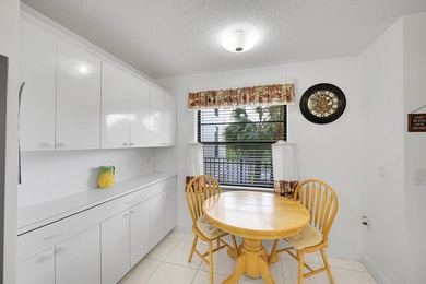 Step into this beautifully updated 55+ condo and immediately on Boca Dunes Golf and Country Club in Florida - for sale on GolfHomes.com, golf home, golf lot