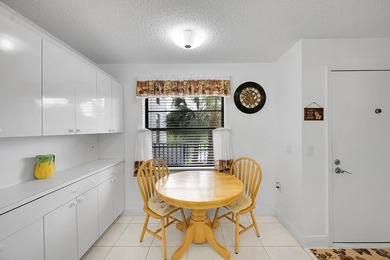 Step into this beautifully updated 55+ condo and immediately on Boca Dunes Golf and Country Club in Florida - for sale on GolfHomes.com, golf home, golf lot