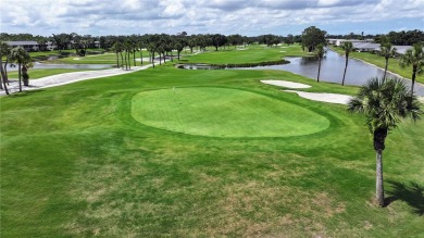 Welcome to this charming and spacious 2-bedroom, 2-bath end-unit on Palm Aire Country Club of Sarasota in Florida - for sale on GolfHomes.com, golf home, golf lot