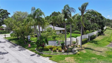 Welcome to this charming and spacious 2-bedroom, 2-bath end-unit on Palm Aire Country Club of Sarasota in Florida - for sale on GolfHomes.com, golf home, golf lot