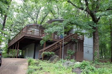 Welcome to the market! This charming home is bursting with on Indian Hills Country Club in Arkansas - for sale on GolfHomes.com, golf home, golf lot