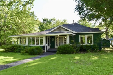 This delightful 3-bedroom, 2-bathroom Craftsman bungalow is on Helena Country Club in Arkansas - for sale on GolfHomes.com, golf home, golf lot