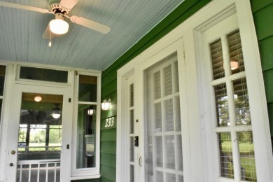 This delightful 3-bedroom, 2-bathroom Craftsman bungalow is on Helena Country Club in Arkansas - for sale on GolfHomes.com, golf home, golf lot