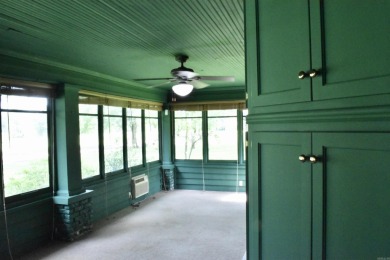 This delightful 3-bedroom, 2-bathroom Craftsman bungalow is on Helena Country Club in Arkansas - for sale on GolfHomes.com, golf home, golf lot