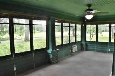 This delightful 3-bedroom, 2-bathroom Craftsman bungalow is on Helena Country Club in Arkansas - for sale on GolfHomes.com, golf home, golf lot