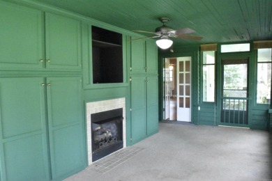 This delightful 3-bedroom, 2-bathroom Craftsman bungalow is on Helena Country Club in Arkansas - for sale on GolfHomes.com, golf home, golf lot