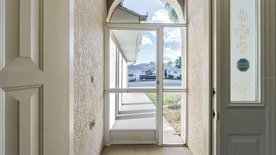 COME to SUNNY FLORIDA! Welcome to resort-style living in the on Tampa Bay Golf and Country Club in Florida - for sale on GolfHomes.com, golf home, golf lot