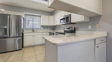 COME to SUNNY FLORIDA! Welcome to resort-style living in the on Tampa Bay Golf and Country Club in Florida - for sale on GolfHomes.com, golf home, golf lot