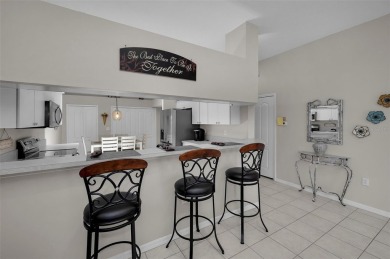 Best value in the neighborhood with easy, LOW-MAINTENANCE living on Meadow Oaks Golf and Country Club in Florida - for sale on GolfHomes.com, golf home, golf lot