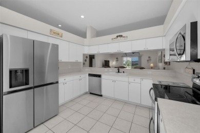 Best value in the neighborhood with easy, LOW-MAINTENANCE living on Meadow Oaks Golf and Country Club in Florida - for sale on GolfHomes.com, golf home, golf lot