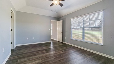 COME to SUNNY FLORIDA! Welcome to resort-style living in the on Tampa Bay Golf and Country Club in Florida - for sale on GolfHomes.com, golf home, golf lot