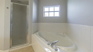 COME to SUNNY FLORIDA! Welcome to resort-style living in the on Tampa Bay Golf and Country Club in Florida - for sale on GolfHomes.com, golf home, golf lot