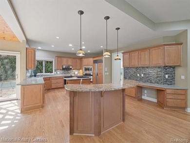 Absolutely Amazing home on the 13th & 14th fairways of Prestwick on Prestwick Village Golf Club in Michigan - for sale on GolfHomes.com, golf home, golf lot