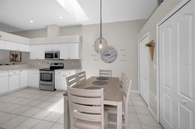 Best value in the neighborhood with easy, LOW-MAINTENANCE living on Meadow Oaks Golf and Country Club in Florida - for sale on GolfHomes.com, golf home, golf lot