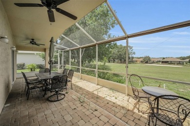 Best value in the neighborhood with easy, LOW-MAINTENANCE living on Meadow Oaks Golf and Country Club in Florida - for sale on GolfHomes.com, golf home, golf lot