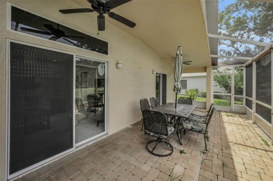 Best value in the neighborhood with easy, LOW-MAINTENANCE living on Meadow Oaks Golf and Country Club in Florida - for sale on GolfHomes.com, golf home, golf lot