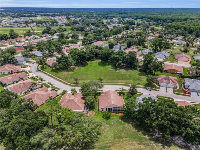 Best value in the neighborhood with easy, LOW-MAINTENANCE living on Meadow Oaks Golf and Country Club in Florida - for sale on GolfHomes.com, golf home, golf lot