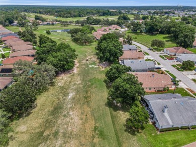 Best value in the neighborhood with easy, LOW-MAINTENANCE living on Meadow Oaks Golf and Country Club in Florida - for sale on GolfHomes.com, golf home, golf lot
