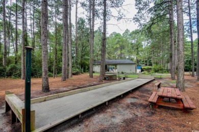Why not sit on your covered screened in deck and watch the on Burning Ridge Golf Course in South Carolina - for sale on GolfHomes.com, golf home, golf lot