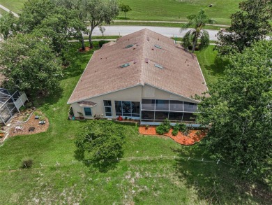 Best value in the neighborhood with easy, LOW-MAINTENANCE living on Meadow Oaks Golf and Country Club in Florida - for sale on GolfHomes.com, golf home, golf lot