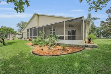 Best value in the neighborhood with easy, LOW-MAINTENANCE living on Meadow Oaks Golf and Country Club in Florida - for sale on GolfHomes.com, golf home, golf lot