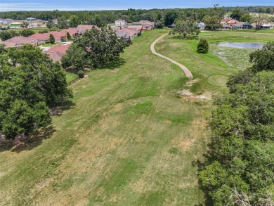 Best value in the neighborhood with easy, LOW-MAINTENANCE living on Meadow Oaks Golf and Country Club in Florida - for sale on GolfHomes.com, golf home, golf lot