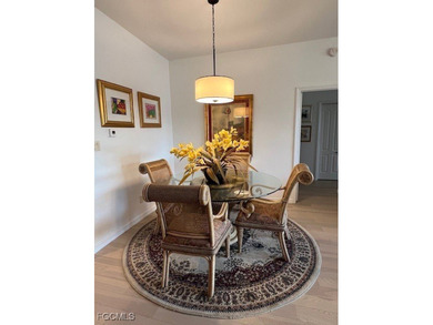 WELCOME TO YOUR NEW HOME with PEACEFUL AND SPECTACULAR LAKE & on Eagle Ridge Golf and Tennis Club in Florida - for sale on GolfHomes.com, golf home, golf lot