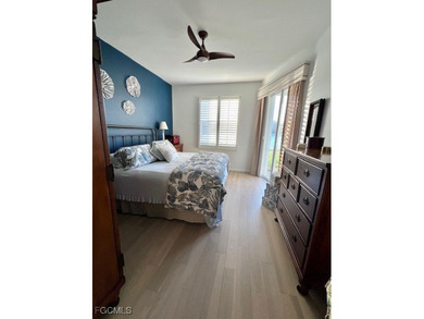 WELCOME TO YOUR NEW HOME with PEACEFUL AND SPECTACULAR LAKE & on Eagle Ridge Golf and Tennis Club in Florida - for sale on GolfHomes.com, golf home, golf lot