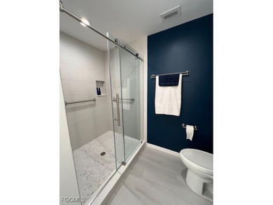 WELCOME TO YOUR NEW HOME with PEACEFUL AND SPECTACULAR LAKE & on Eagle Ridge Golf and Tennis Club in Florida - for sale on GolfHomes.com, golf home, golf lot