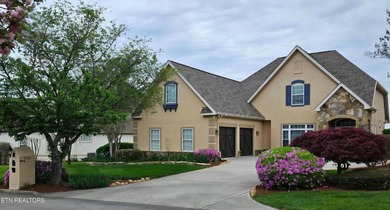 After driving past the picturesque stables and horses and on Rarity Bay Country Club - Loudon in Tennessee - for sale on GolfHomes.com, golf home, golf lot