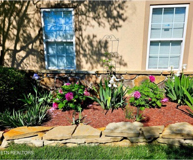 After driving past the picturesque stables and horses and on Rarity Bay Country Club - Loudon in Tennessee - for sale on GolfHomes.com, golf home, golf lot