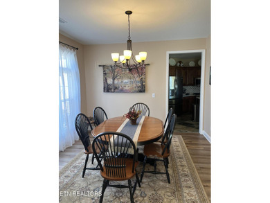 After driving past the picturesque stables and horses and on Rarity Bay Country Club - Loudon in Tennessee - for sale on GolfHomes.com, golf home, golf lot