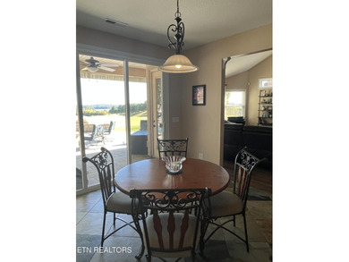 After driving past the picturesque stables and horses and on Rarity Bay Country Club - Loudon in Tennessee - for sale on GolfHomes.com, golf home, golf lot