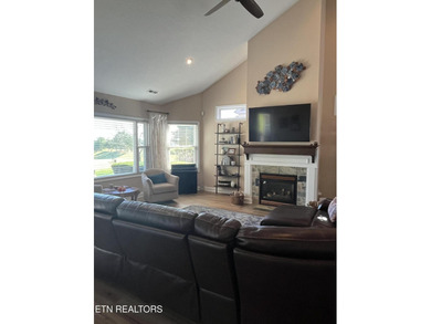 After driving past the picturesque stables and horses and on Rarity Bay Country Club - Loudon in Tennessee - for sale on GolfHomes.com, golf home, golf lot