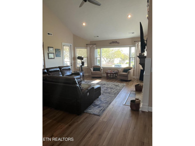 After driving past the picturesque stables and horses and on Rarity Bay Country Club - Loudon in Tennessee - for sale on GolfHomes.com, golf home, golf lot