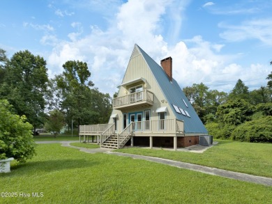 Welcome to 211 Country Club Road--a one-of-a-kind A-frame on Rock Creek Country Club in North Carolina - for sale on GolfHomes.com, golf home, golf lot