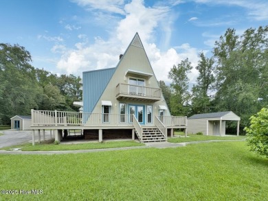 Welcome to 211 Country Club Road--a one-of-a-kind A-frame on Rock Creek Country Club in North Carolina - for sale on GolfHomes.com, golf home, golf lot