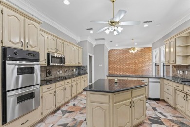 Welcome to this tastefully designed single-story home that sits on De Cordova Bend Country Club in Texas - for sale on GolfHomes.com, golf home, golf lot