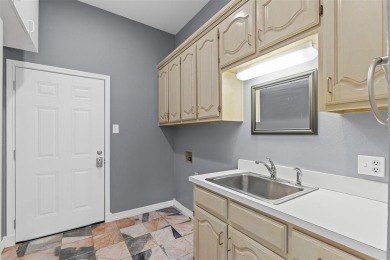 Welcome to this tastefully designed single-story home that sits on De Cordova Bend Country Club in Texas - for sale on GolfHomes.com, golf home, golf lot