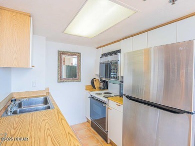 Spacious 1-bedroom, 1.5-bathroom condo on the 8th floor of the on Oceans Golf Club in Florida - for sale on GolfHomes.com, golf home, golf lot