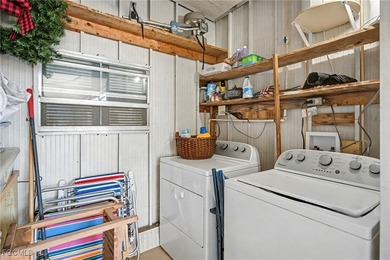 Beautifully remodeled, fully furnished manufactured home in a on Riverbend Golf and Country Club in Florida - for sale on GolfHomes.com, golf home, golf lot