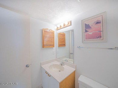 Spacious 1-bedroom, 1.5-bathroom condo on the 8th floor of the on Oceans Golf Club in Florida - for sale on GolfHomes.com, golf home, golf lot