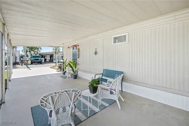 Beautifully remodeled, fully furnished manufactured home in a on Riverbend Golf and Country Club in Florida - for sale on GolfHomes.com, golf home, golf lot