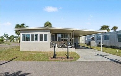 Beautifully remodeled, fully furnished manufactured home in a on Riverbend Golf and Country Club in Florida - for sale on GolfHomes.com, golf home, golf lot