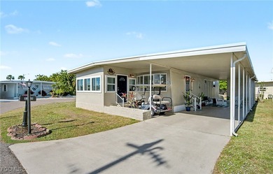 Beautifully remodeled, fully furnished manufactured home in a on Riverbend Golf and Country Club in Florida - for sale on GolfHomes.com, golf home, golf lot