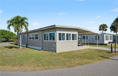 Beautifully remodeled, fully furnished manufactured home in a on Riverbend Golf and Country Club in Florida - for sale on GolfHomes.com, golf home, golf lot