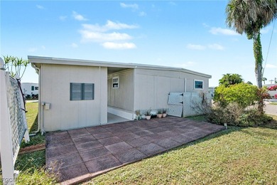 Beautifully remodeled, fully furnished manufactured home in a on Riverbend Golf and Country Club in Florida - for sale on GolfHomes.com, golf home, golf lot
