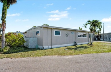 Beautifully remodeled, fully furnished manufactured home in a on Riverbend Golf and Country Club in Florida - for sale on GolfHomes.com, golf home, golf lot