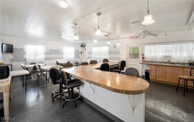 Beautifully remodeled, fully furnished manufactured home in a on Riverbend Golf and Country Club in Florida - for sale on GolfHomes.com, golf home, golf lot