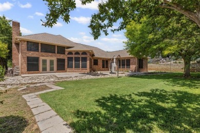 Welcome to this tastefully designed single-story home that sits on De Cordova Bend Country Club in Texas - for sale on GolfHomes.com, golf home, golf lot